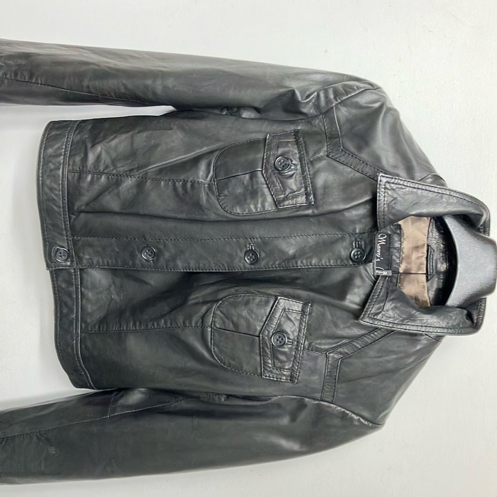 Cute, soft leather ‘jean jacket’.  Button front.  Soft brass colour lining.